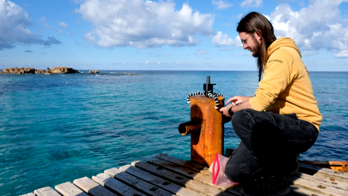 Na zdjęciu: Paweł Czernic podczas badań w Ptolemais